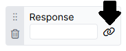 Screenshot of Response field in a question with an arrow pointing to the binding icon to the right